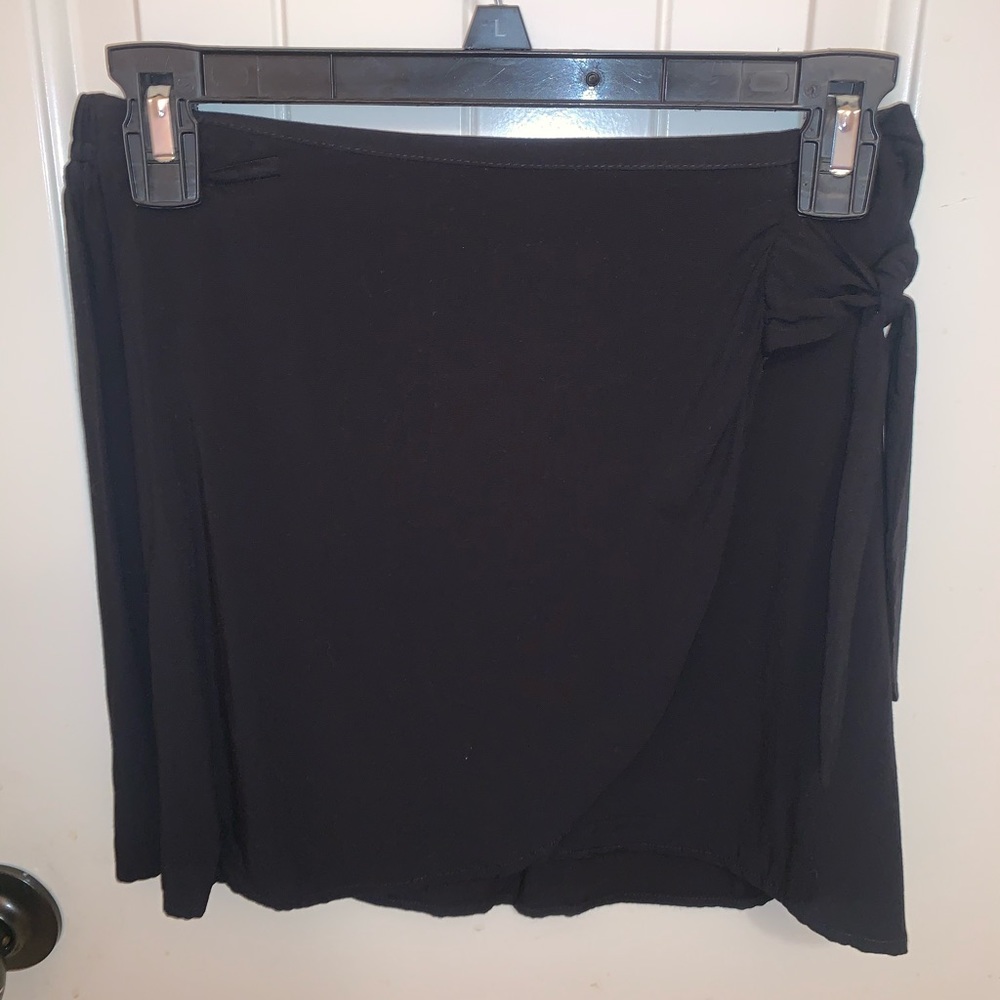 black cross over skirt